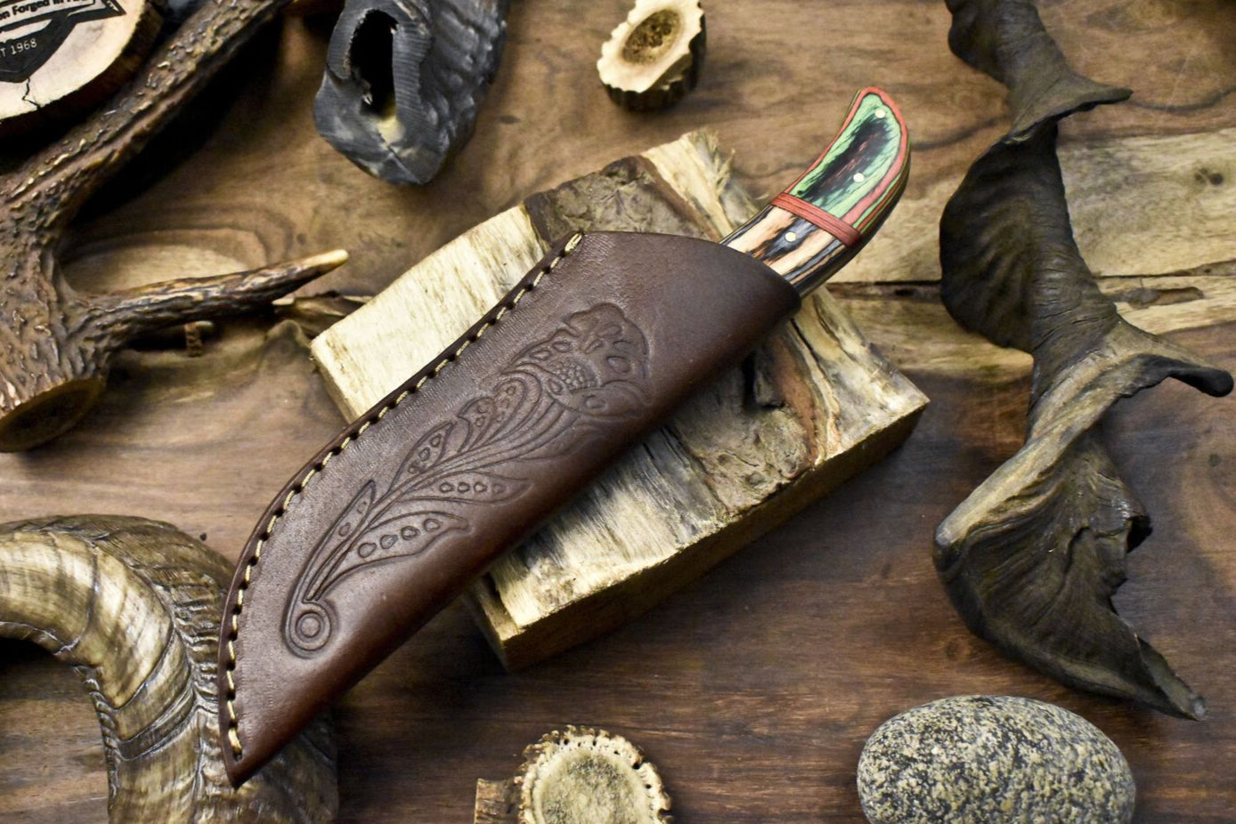 Forged Twist Damascus Skinner Knife with Gut Hook and Hard Wood Handle for Camping