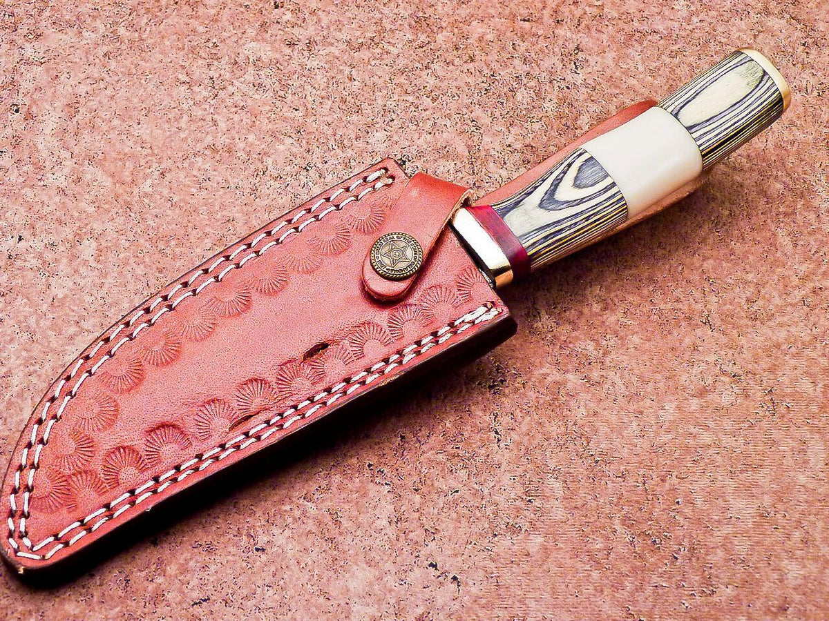 10 inch Damascus clip point hunting knife with a gray hardwood and white bone handle
