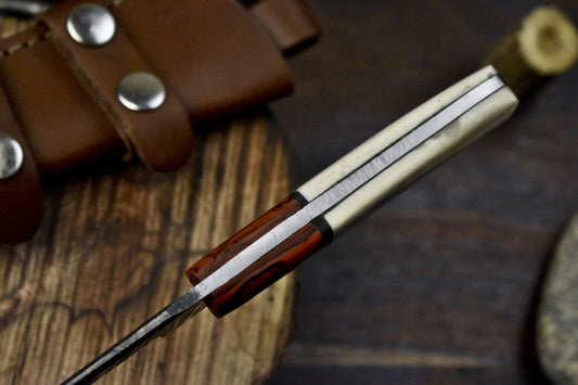 Handmade Damascus Skinner Knife with Twist Pattern Blade, Bone Handle, and Micarta Bolster – Outdoor Fixed Blade Hunting Knife