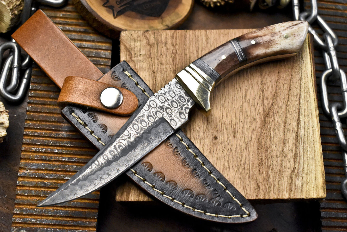 Forged Rain Drop Damascus Skinner Knife – Bone Handle with Brass Guard and Leather Sheath