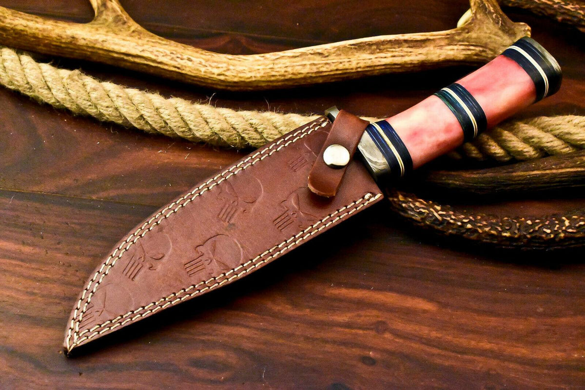 Close up of hand forged Damascus steel blade pattern and edge