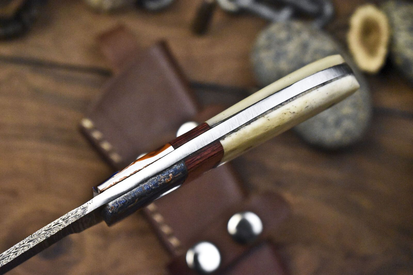 Forged Twist Damascus Skinner Knife with Gut Hook and Bone Handle for Camping
