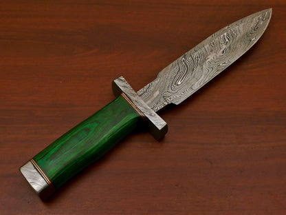 Green pakkawood handle with dark flowing grain