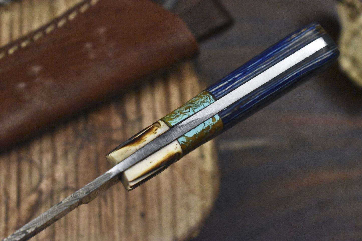 Hand Forged Twist Damascus Skinner Knife with Mixed Material Handle for Survival and Hunting