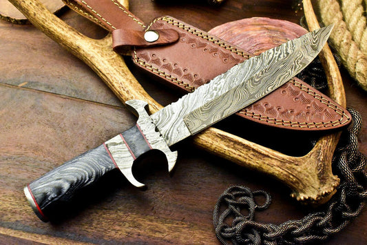 13.5 inch Damascus hunting knife, full view with tooled leather sheath
