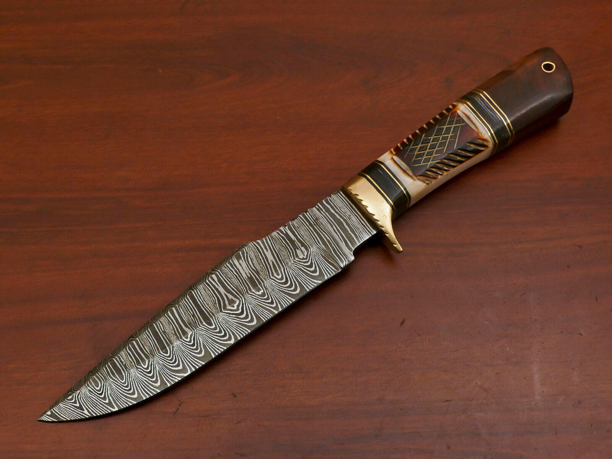 Hand forged Damascus blade with carved bone handle and rosewood pommel