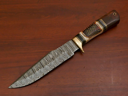 Hand forged Damascus blade with carved bone handle and rosewood pommel