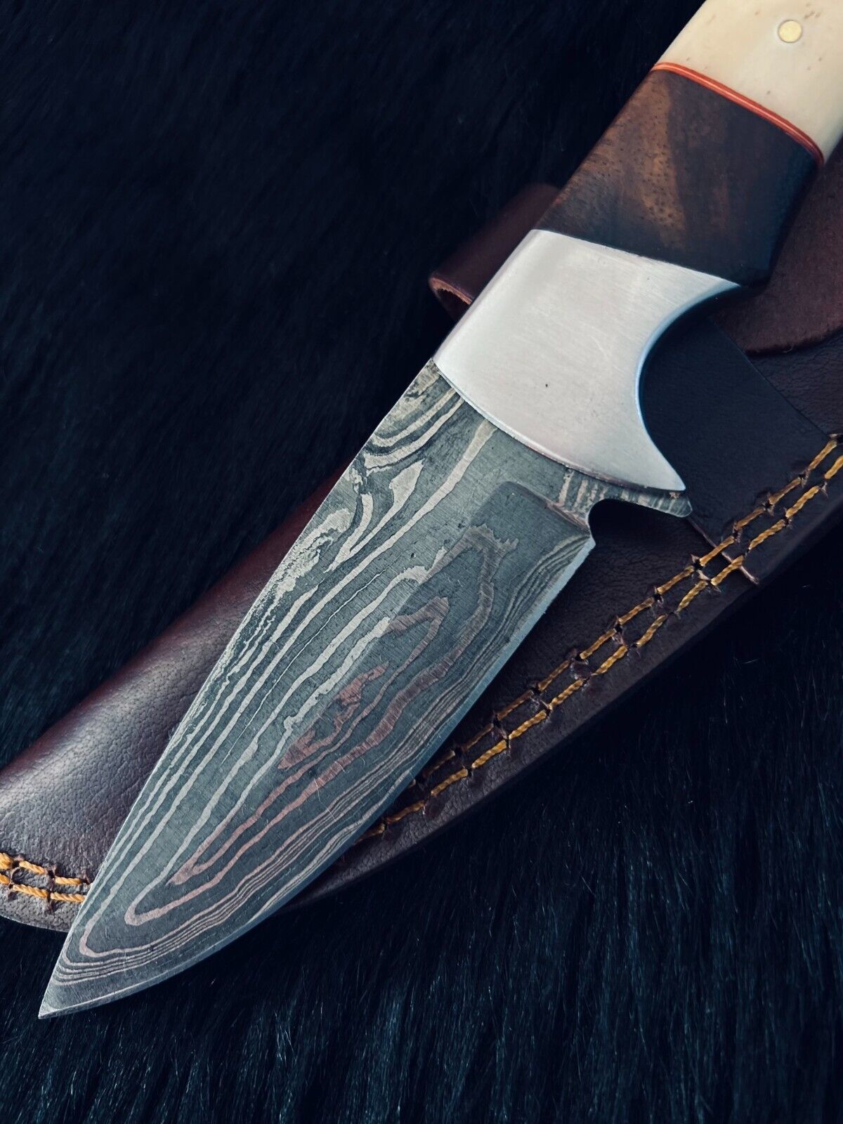Heritage Forge 9 Inch Twist Damascus Skinner Knife with Camel Bone and Wood Handle