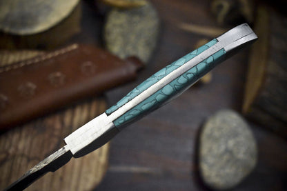 9.5" Twist Damascus Skinner Knife with Corian Handle and Steel Bolster – Unique Fishing Blade