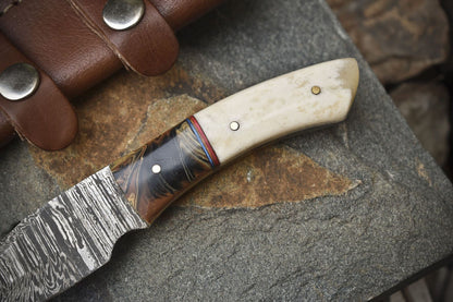 Hot Item Twist Damascus Skinner Knife with Bone Handle and Micarta Bolster for Hiking