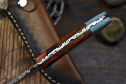 Twist Damascus Skinner Knife with Corian Handle and Micarta Bolster – Custom Forged for Camping