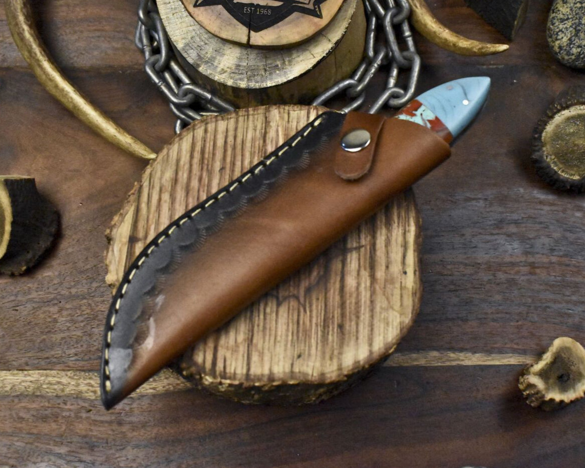 Twist Damascus Skinner Knife with Corian Handle and Micarta Bolster – Custom Forged for Camping