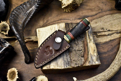 Twist Damascus Skinner Knife with Ram's Horn Handle and Brass Guard