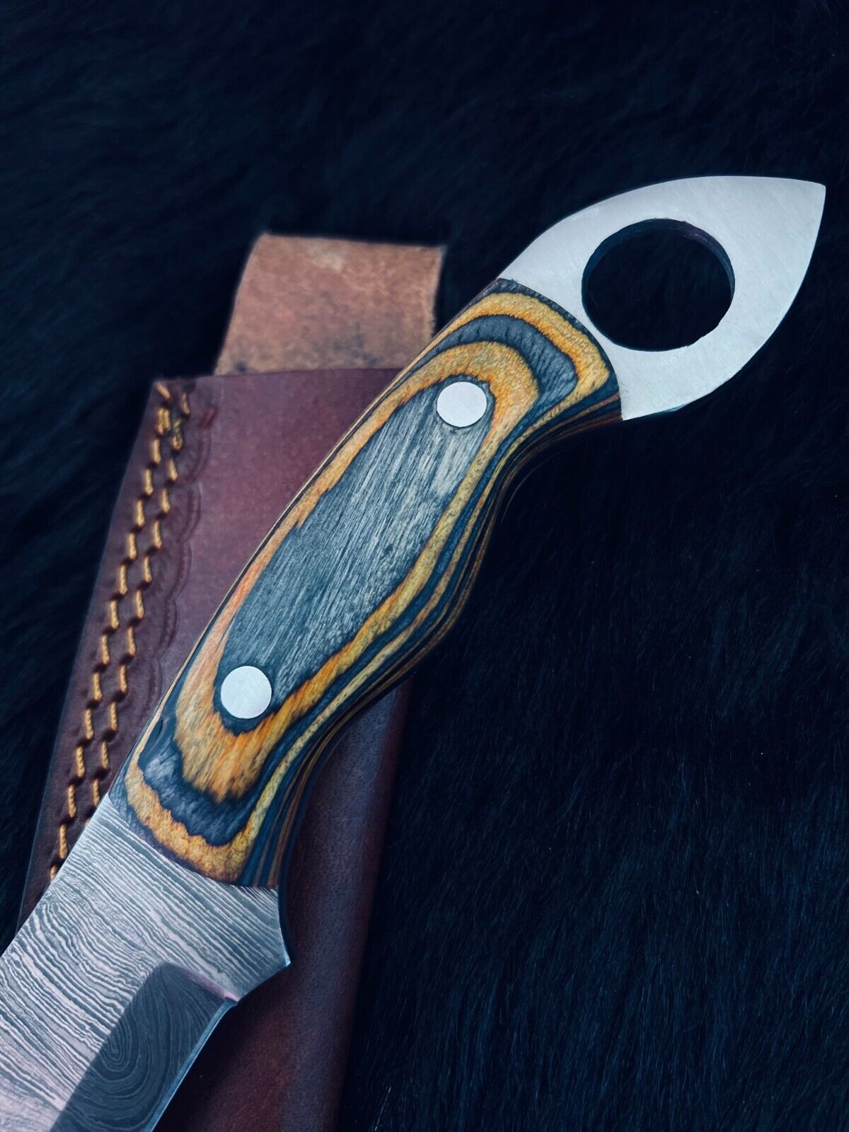 Heritage Forge 10.5 Inch Twist Damascus Steel Bowie Knife with Camel Bone and Wood Handle