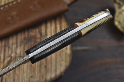 Custom Forged Twist Damascus Skinner Knife Bone and Wood Hunting Blade
