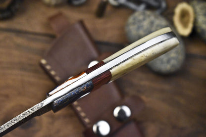 Forged Twist Damascus Skinner Knife with Gut Hook and Bone Handle for Camping