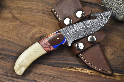 Forged Twist Damascus Skinner Knife with Gut Hook and Bone Handle for Camping
