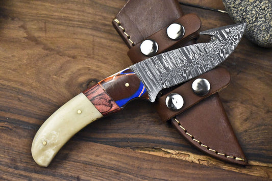 Forged Twist Damascus Skinner Knife with Gut Hook and Bone Handle for Camping