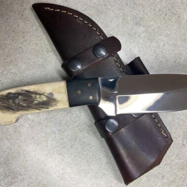 Handmade Skull Skinner Knife – Mirror Polished D2 Steel Blade with Camel Bone Handle & Leather Sheath