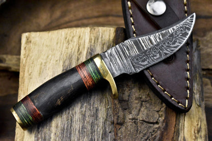 Twist Damascus Skinner Knife with Ram's Horn Handle and Brass Guard